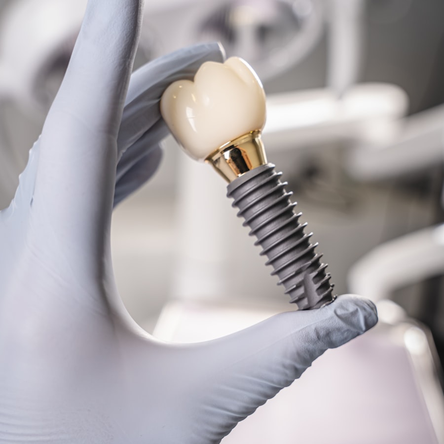 An implant and crown held in a gloved hand